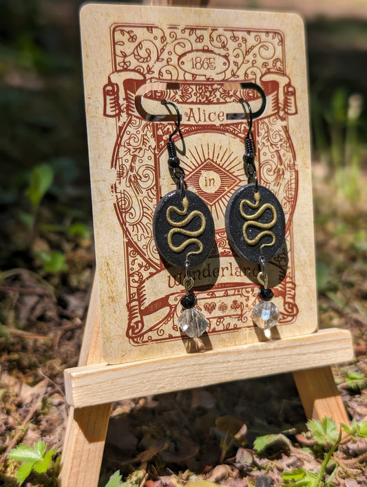 The Dainty Danger Noodles | Black + Gold Snake Pendant Clay Earrings